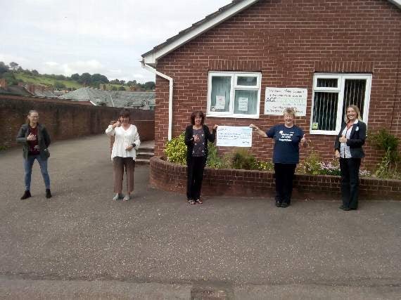 At the cheque presentation to Age Concern Crediton.