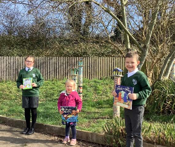 The winners of the book competition with their prizes at Copplestone Primary School.