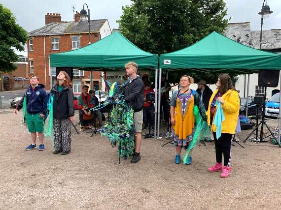 Members of The Turning Tides Project performing.