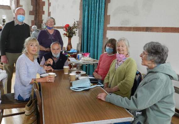 Kathleen Hughes, back right, one of the organisers of St Lawrence Chapel Open Afternoon, with visitors enjoying coffee and cake. NP 070821 01