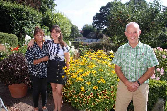 Open Garden hosts Miranda and Roger Olver of White Cottage, with their daughter, Ali McGeown. AQ 3547