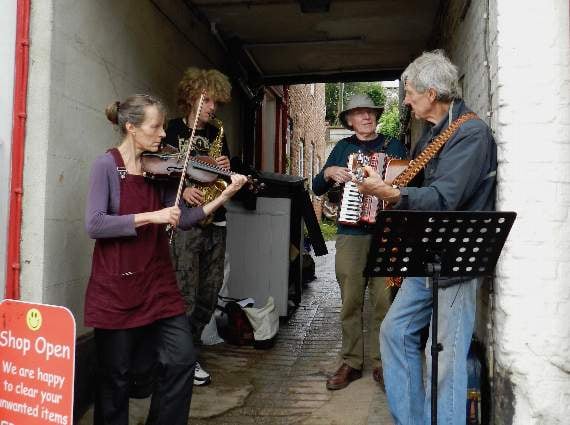 The Second Sight Band (Francisca Van Holthoon, Daniel Richards, Steve Turner, John Richards) busking on Saturday, August 21. NP 210821 06