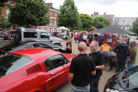A view of a busy town square during the Cars and Coffee event. AQ 2198