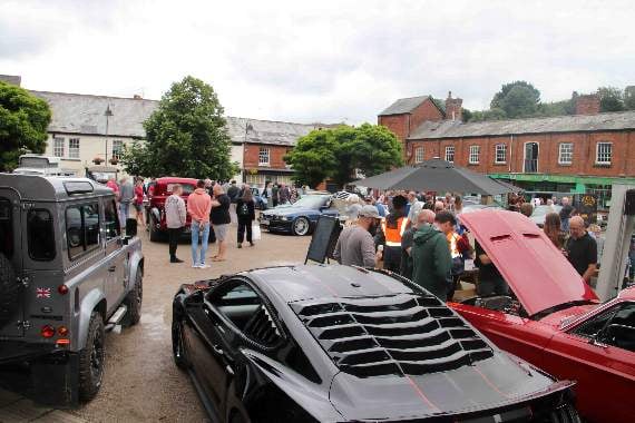 A view of a busy town square during the Cars and Coffee event. AQ 2216