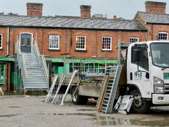Temporary scaffolding steps have been erected to allow access to R and G Barbershop on Crediton Town Square. NP 011021 01