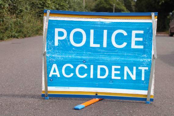 A road closure sign at the scene. AQ 3809