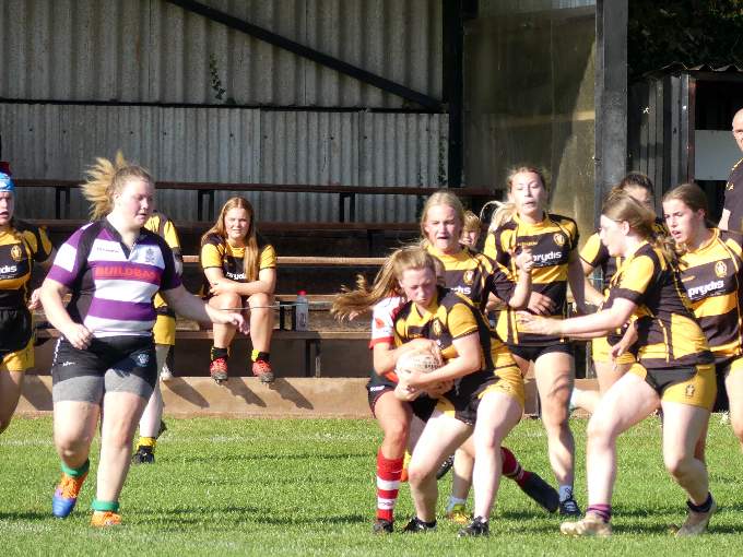 The Under 18s show their outstanding support during the game.