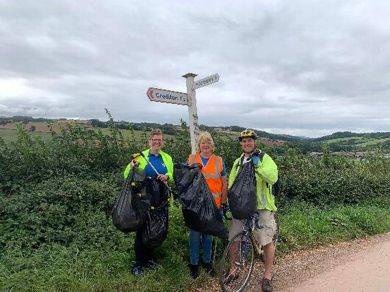 Fiona Mortimer, Ruth Vigers and Christopher Bailey at the bottom of Uton Steep as their routes converged during the litter pick.