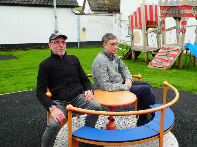 Susan's sons, Andrew and Chris try out the roundabout.