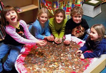 Pupils cash up to save the children