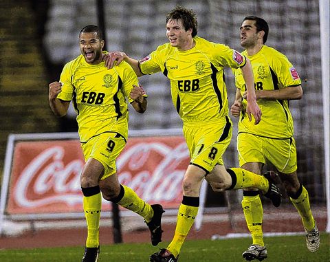 John Grant celebrates the first of his two goals in the midweek win at Rotherham. Picture: Ian Morseman