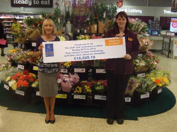 Jackie Ridge, from St Michael's Hospice, and Debby Bridger, from Sainsbury's Alton with the cheque