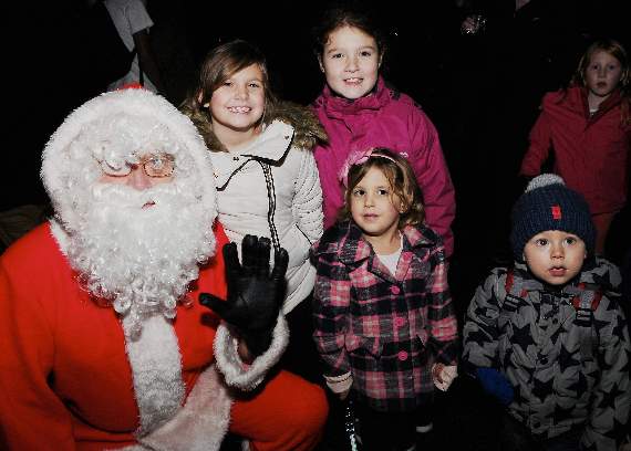 Santa switches on Christmas lights