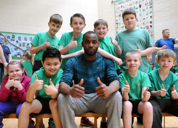 Triple jump champ put pupils through paces