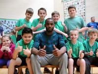 Triple jump champ put pupils through paces