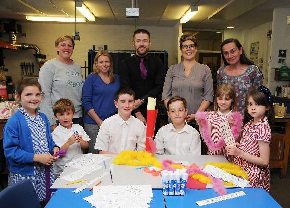 Tamsin Yates from Binsted School, Veronica Baker from Bentworth School, Michael Daffon from Amery Hill School, Jo Ayres from Bentworth School and Tanya Cornaia from Chawton School with pupils making a torch for the Race for Life. Picture order no: AD26-142-16 (altonherald.com)