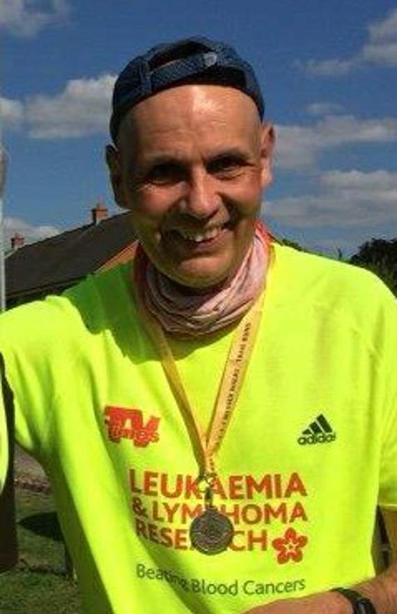 Ton up for brave marathon man