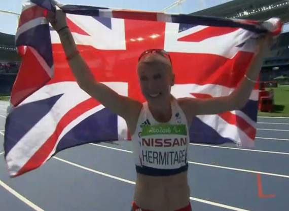 Jubilant Georgie Hermitage flies the flag after winning gold in Rio today