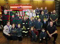 Bordon firefighters pictured with Cubs from the 1st Headley Scouts (BD42-156-16)