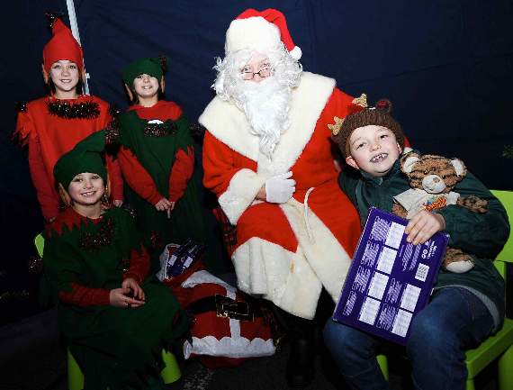 Santa with his little helpers at Beacon Hill’s Christmas market on Sunday