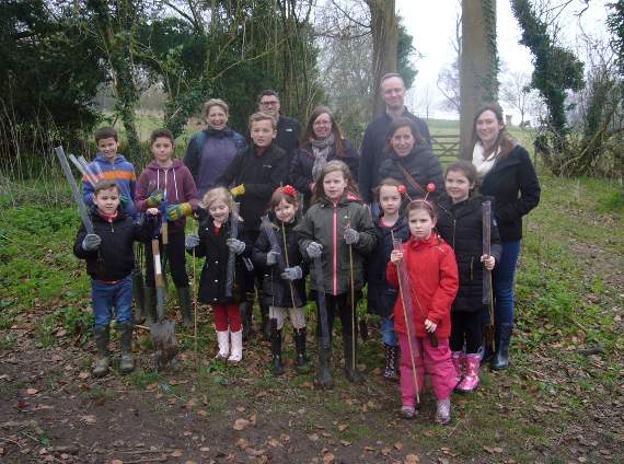 Some of the tree planters and their adult helpers