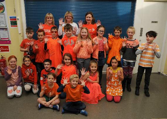 Rhona Lawrence, Sue Barnley and Gillian Payne with ‘orange’ pupils