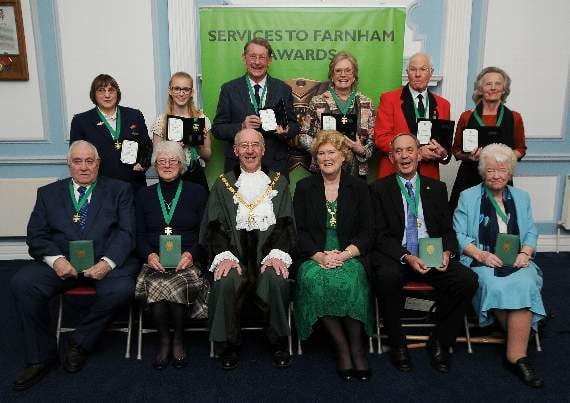 <p>Sue Farrow, pictured furthest right in front right, with fellow recipients of the Services to Farnham Award and the then-mayor and mayoress of Farnham, John and Gillian Ward</p>