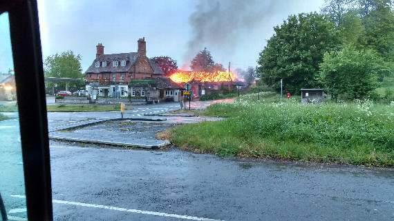 Fire takes hold in the stables behind The Hen and Chicken at Froyle. Picture: ROBERT BATES