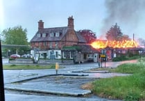 Fire drama behind A31 pub