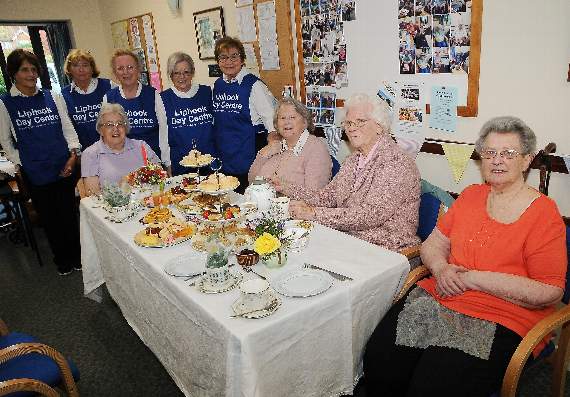 Left to right (back): Urmila Martingale, Janet Werner, Anne Hall, Jenny Wiseman and Barbara Frost with centre visitors. Picture order no: LD39-59-17