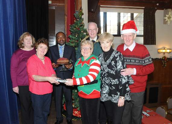Priests Eddie Richer, and Thom Amungwa with the lunch organisers