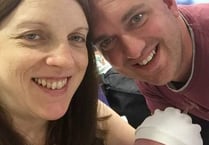 Dad left holding the baby – literally!