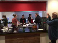 Jane Devonshire pulls the blind to formally open the new kitchen and to pay tribute to all the Alton Rugby Club volunteers who have worked hard to make it a success