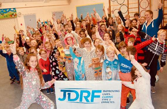Children at Chawton Primary School wore onesies and pyjamas to school to raise money for the Juvenile Diabetes Research Foundation