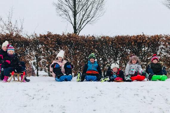 Children on their sledges behind Liphook’s Millennium Centre