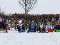 Children on their sledges behind Liphook’s Millennium Centre