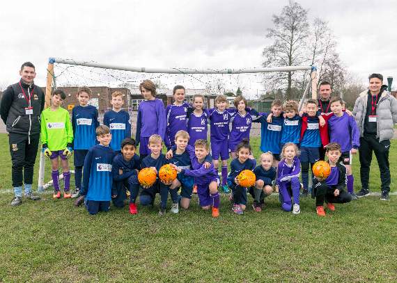 Members of Farnham Football Club at a training session with William Cobbett pupils:  (Photo: Paul Fitchett)