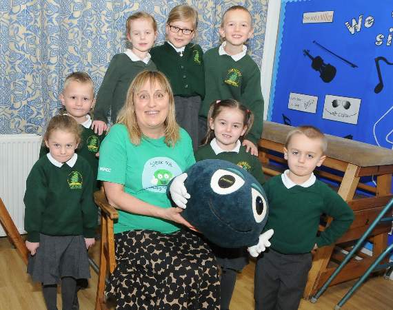 The NSPCC’s Jane Dray with pupils at Fernhurst Primary School