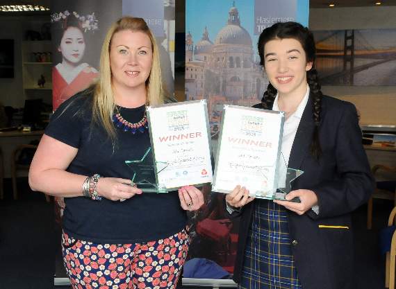 Isla Morrison, aged 14, (right) receives her two awards in the 2018 Surrey Young Superstars from Gemma Antrobus (HD20-209-18)