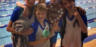 School swim team crowned county champions