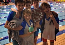 School swim team crowned county champions