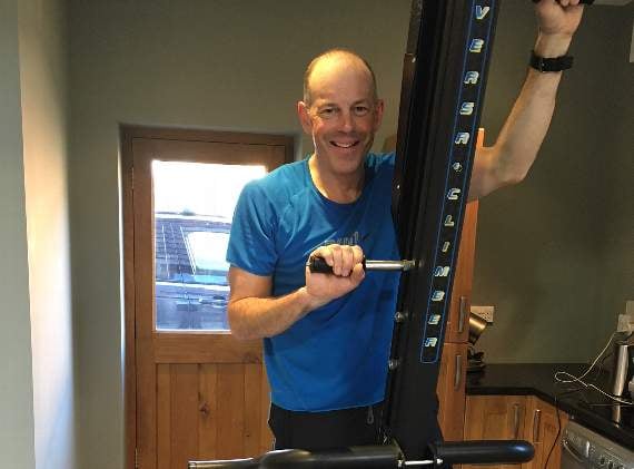 TV presenter Phil Spencer training on the Versaclimber at home