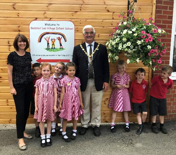 Headteacher at Badshot Lea Village Infant School, Gemma Ball and Mayor of Farnham, David Attfield with some of the school’s pupils