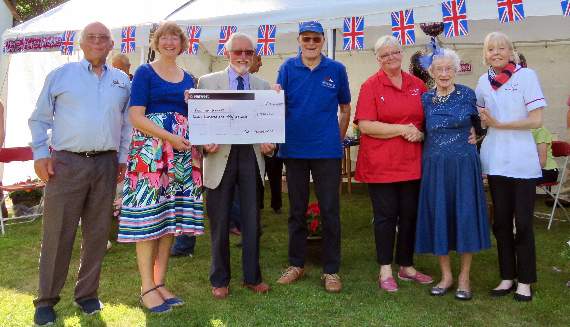 Isabel Muir celebrates with a donation