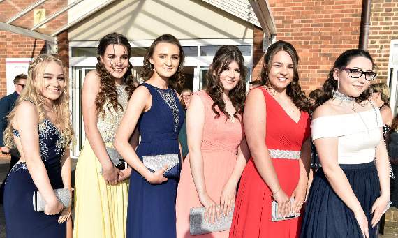 Dressed to impress: School-leavers were cheered on by proud parents and teachers as they arrived at All Hallows’ prom