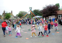 Badshot Lea children dance around maypole
