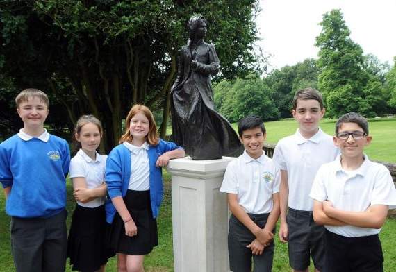 Pupils from Chawton Primary School pupils Holly, Logan, Leo, Owen, Keren and Lola were at the ceremony with headteacher Dawn Tilley. Picture order no: AD25-56-18