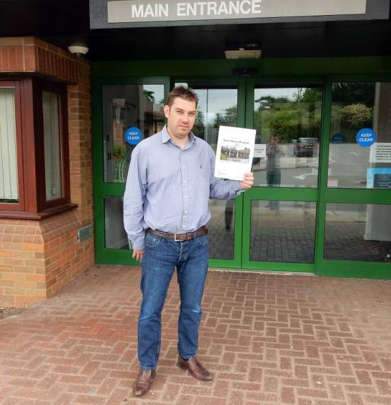 Health campaigner James Brand outside the Chase with his petition