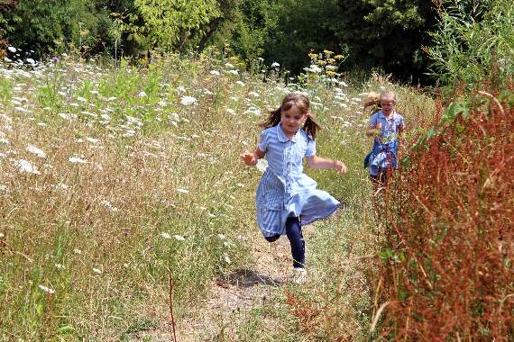 Catch me if you can: In between activities there was lots of time for the youngsters to play in the meadow