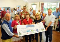 Village fete proceeds handed out